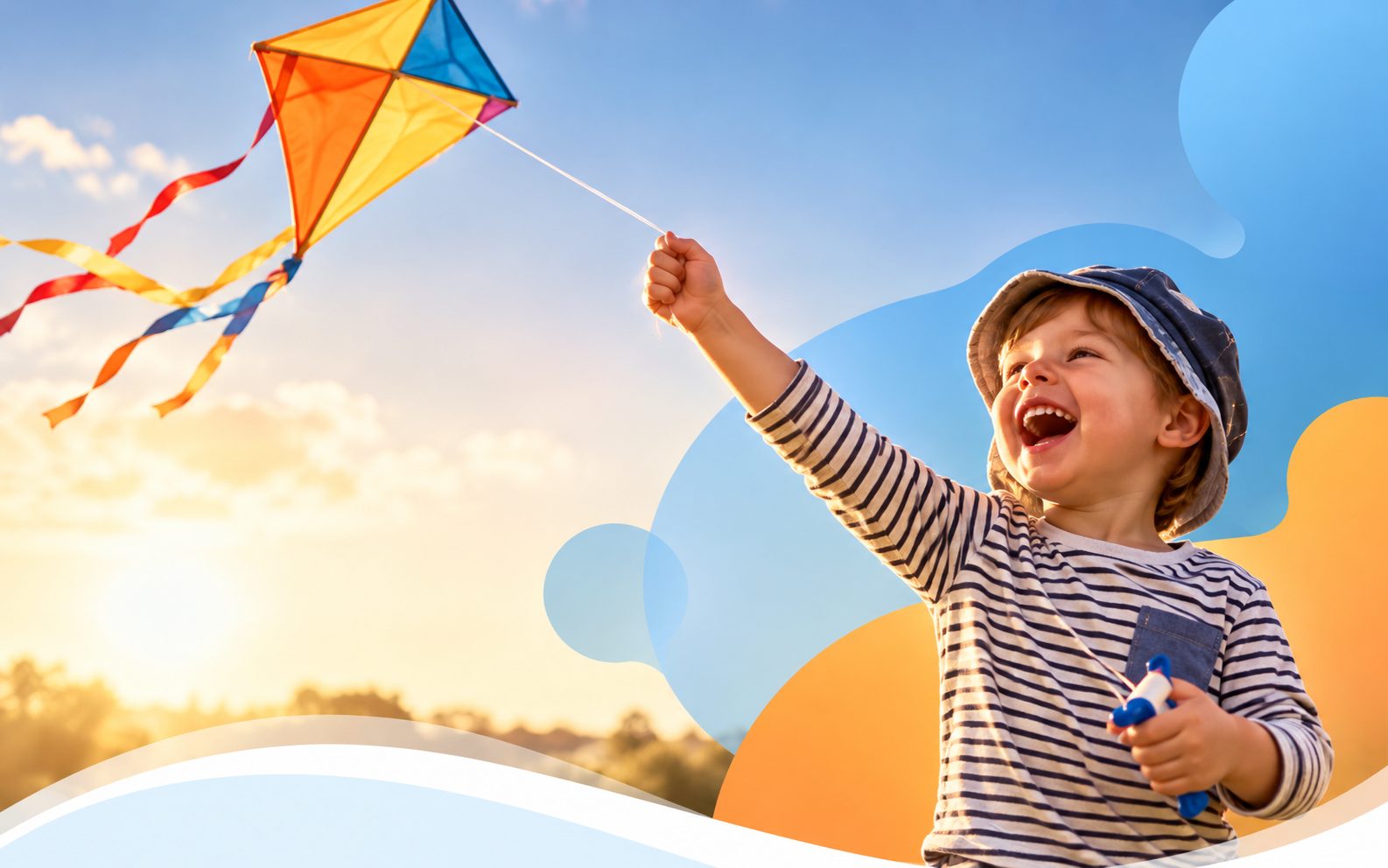 A young child in a blue hat flying a colorful kite in an open field at sunset
